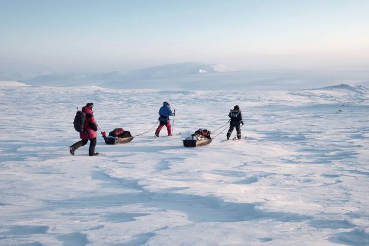 Explorers traveling on ice