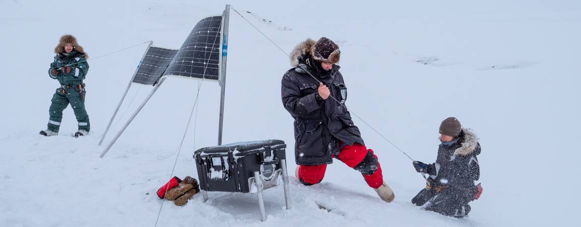 The Polar Bears International team sets up maternal den cams in Svalbard