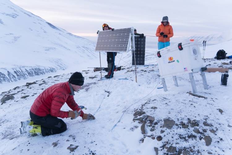The Polar Bears International team sets up maternal den cams in Svalbard